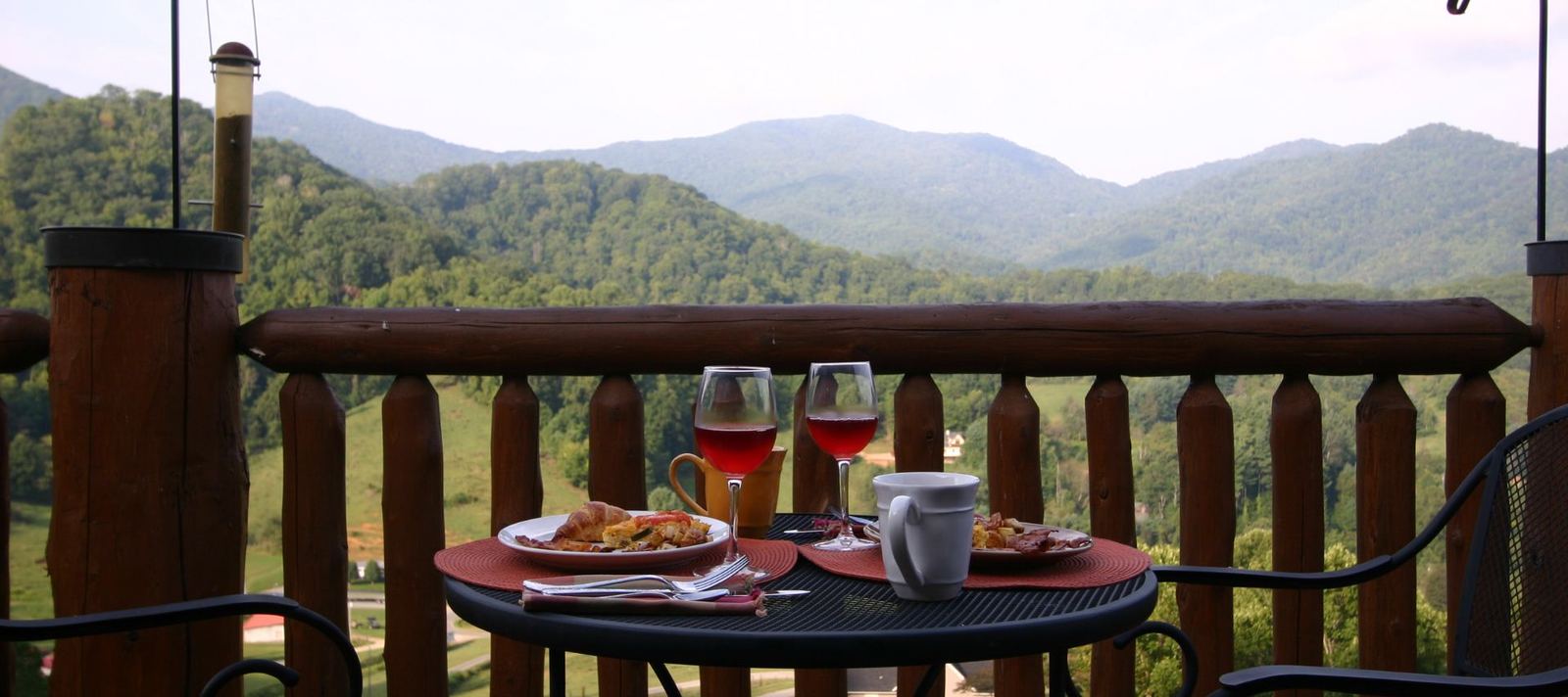 Breakfast served on a Wildberry Lodge balcony above the mountains