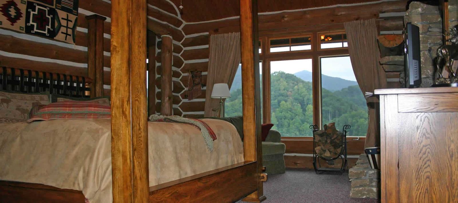 Blackberry Suite at Wildberry Lodge, king four-poster bed facing mountain views